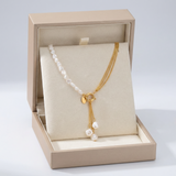 Collana elegante con pendente di perle